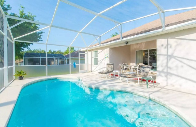 cerca de la piscina privada de Disney 4 dormitorios y 3 baños Sala de juegos familiar HDTV Wi-Fi