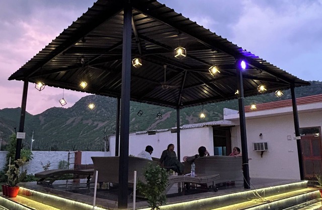 Nestled amidst majestic mountains, our farmhouse offers a serene and picturesque