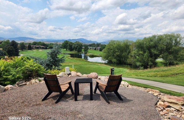 Nestled on the Marianna Butte Golf Course in Loveland, this modern garden-level basement retreat offers stunning mountain & lake views through large windows, flooding the space with light. Just a short drive to CSU campus & Estes Park