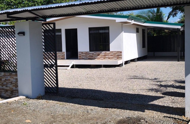 New 2 bdr beach house with WIFI, BBQ and secure carport. Relax in style.