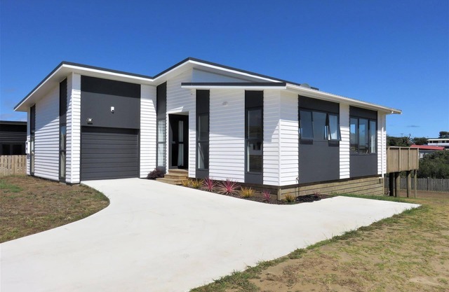 New 4 bed 2 bath house with sea views at Baylys Beach, Northland!