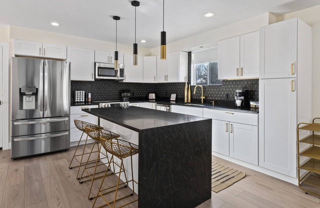 New 6 Bedroom Home w/ 2 Kitchens!