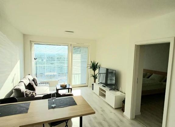 New air-conditioned apartment 5 minutes by walk from the airport with free garage parking