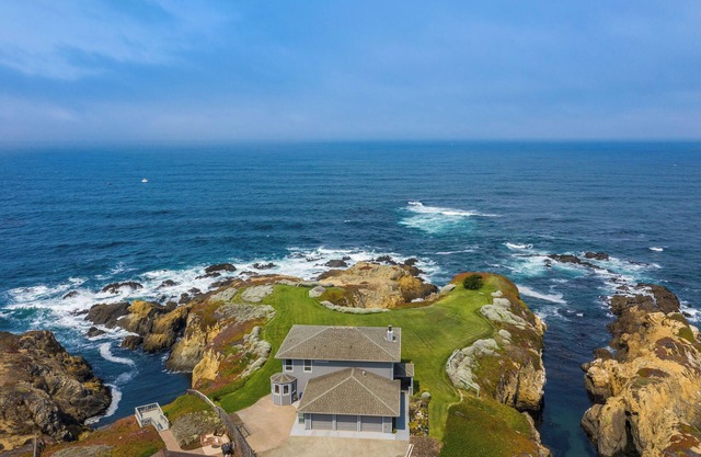 New as a Rental - Breakers Point - Situated on its Own Private Peninsula!