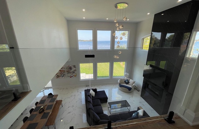 New home|Hot tub|Private beach|Lake front