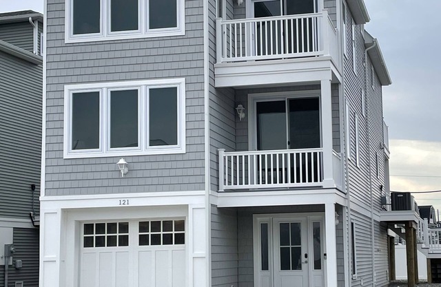 New home with private beach and rooftop deck