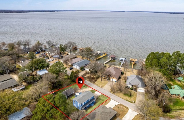 New listing special with a large deck next to the lake!