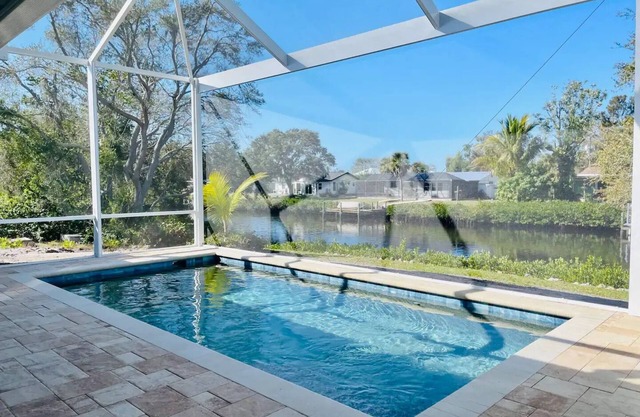 New Pool! - Tropical Waterfront Cottage -Dock & Optional Boat