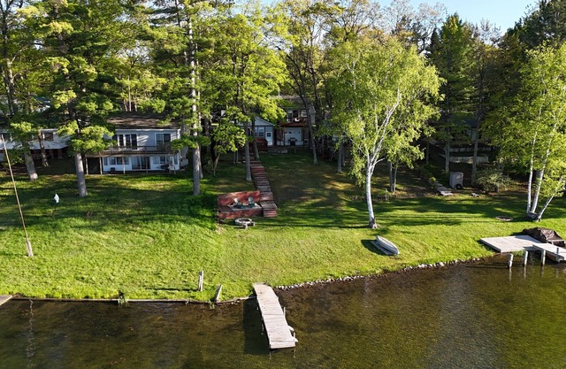 New! Seven Oaks at Bass Lake - Beautiful Lakefront Getaway with Dock and Canoe!