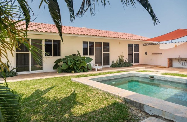 NEW Tropical Garden with Shared Pool plus BBQ and Beach 660 mts