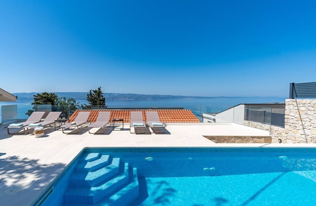 Villa Atopos with heated pool,panoramic sea views
