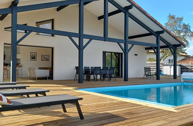 New villa with large wooden terrace 130 m2+ heated pool (May to October)&climate