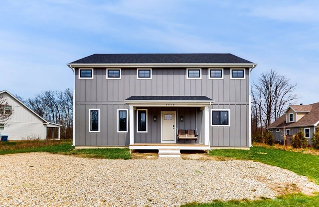 Newly-built home on a grassy lot with washer/dryer & screened deck