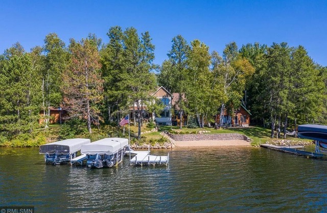 NEWLY BUILT, MODERN HOME on the WHITE FISH CHAIN! Sandy beach with Sunset View