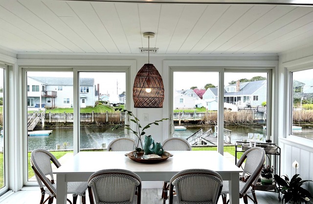 Newly furnished, sunny waterfront house with dock and walking distance to beach!