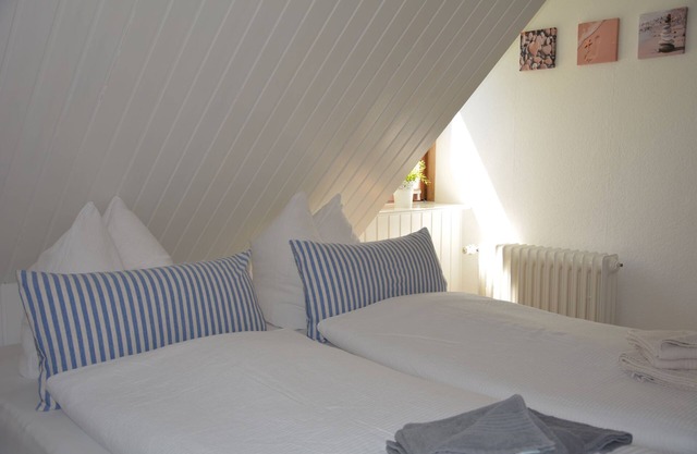 Newly furnished vacation apartment in direct tidal flat location with balcony and sea view.