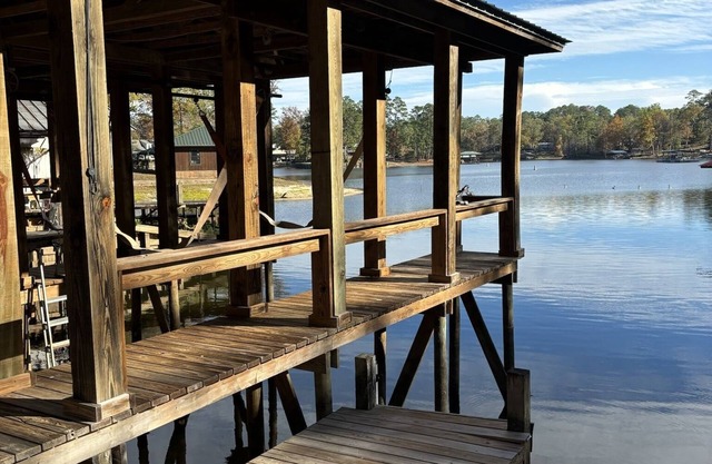 Newly remodeled lake front property with boat dock and oversized yard