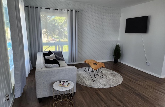 Newly renovated home in the heart of Cochrane close to lake and downtown