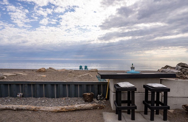 Newly updated 3-bed 2-bath with your own private sandy beach and a creek