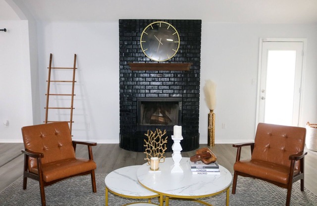 Family-sized home: 4 rooms, 2 bathrooms, garage, and patio.