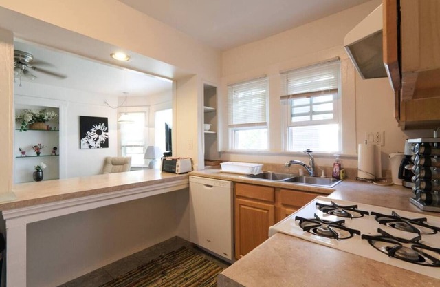 Nice 1 bedroom apartment set up with 2 queen beds with one in the living room. The kitchen and bar area still provide ample space and can accommodate up to 5 people.