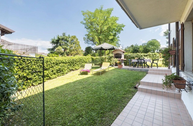 Hermoso apartamento en villa para 6 personas con TV, patio y aparcamiento