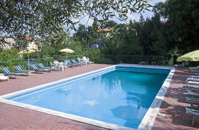 Hermoso apartamento para 7 personas con WIFI, piscina, TV, patio, mascotas permitida y aparcamiento