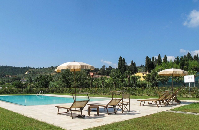 Bonito apartamento en villa para 4 personas con piscina, WIFI, A/C, TV, terraza y aparcamiento