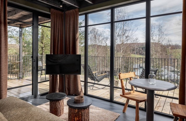 Nice lodge with a view on a natural resort