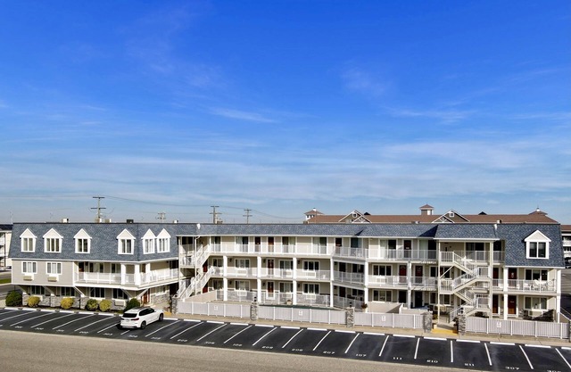 Condominio Merrimac con aire acondicionado de una habitación bien equipado que ofrece una ubicación frente al mar
