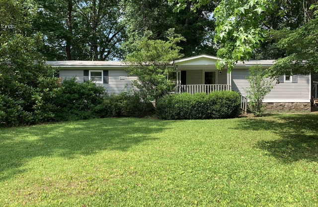 NO ORDINARY TRAILER! A delightful getaway on The Little Red River with hot tub!