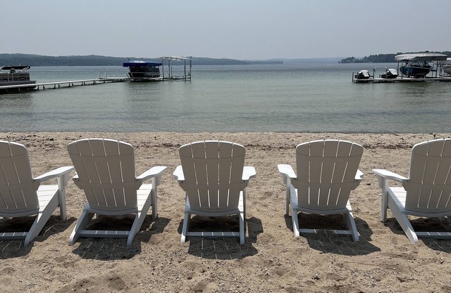 North Lake Leelanau carriage/cottage. Sandy beach front on North Lake Leelanau.