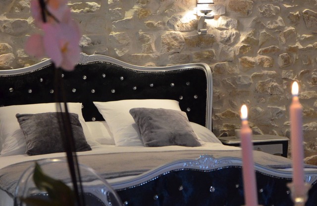 O2suites ambiente barroco con jacuzzi privado