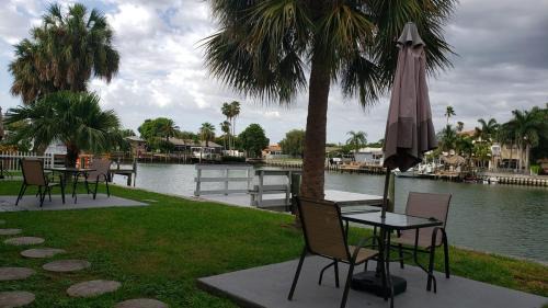 Oasis Waterfront Treasure Island Apartment with Patio Dock and Johns Pass