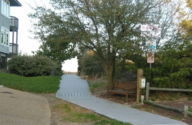Pasarela de acceso al océano a 50 pies de su puerta principal