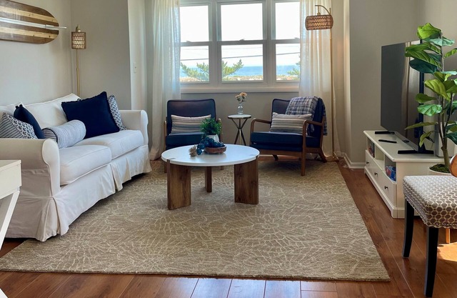 Beautifuly renovated with Ocean and River views, walk to beach and dining!