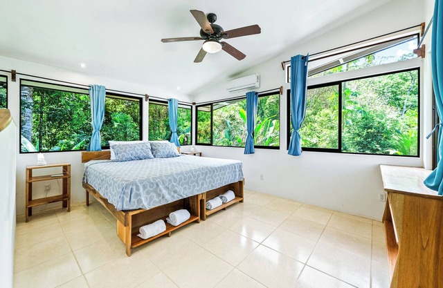 Ocean, jungle views, modern house in Pavones with A/C, WiFi, bidets, hot H2O.