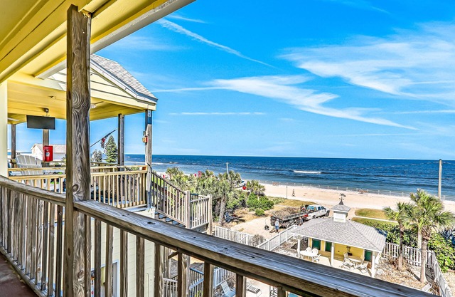 Oceanfront condo with pool, balcony, ocean views, W/D, & central AC