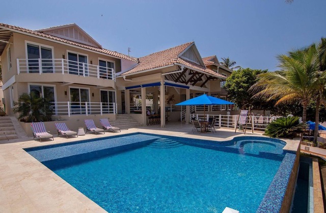 Casa frente al mar de Barú con playa privada, piscina y 6 habitaciones