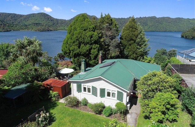 Okareka Lakefront - Four Bedroom Original Lake House with Fantastic Lake Views