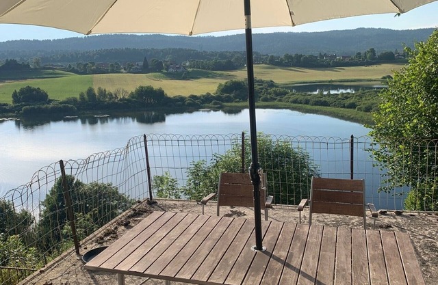 Old Jura farmhouse with panoramic view of Lac de l'Abbaye