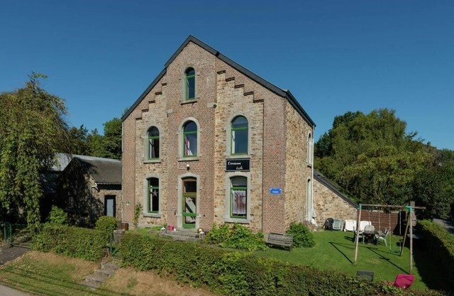 Old school in a pretty little village surrounded by forest