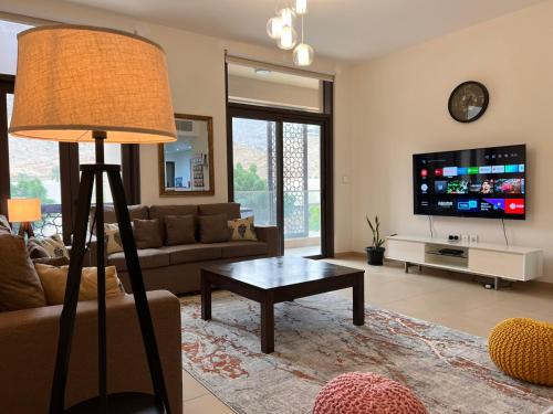 ONE Guest Place Elegant 2BHK Apartment in Muscat Bay