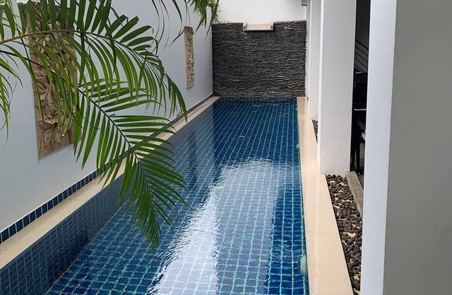 One World One Home Naiharn Hotel