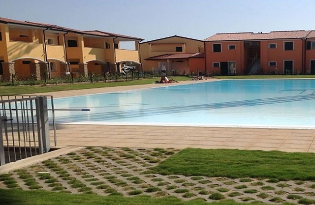 Apartamento "ORCHIDEA" con piscina, en el mar en Badesi (OT)
