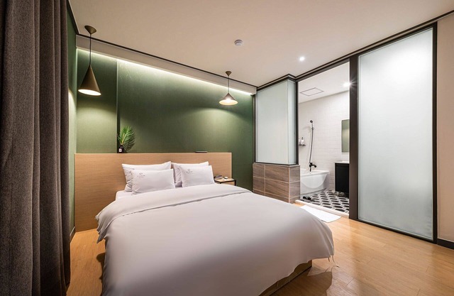 Osan Hotel Raum