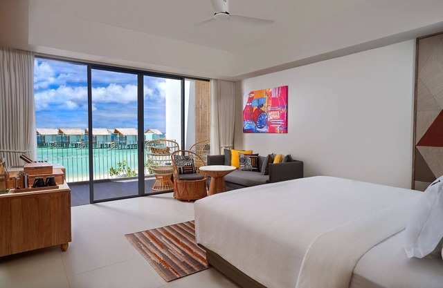 Overwater Studio with Balcony & Rock-Inspired Style