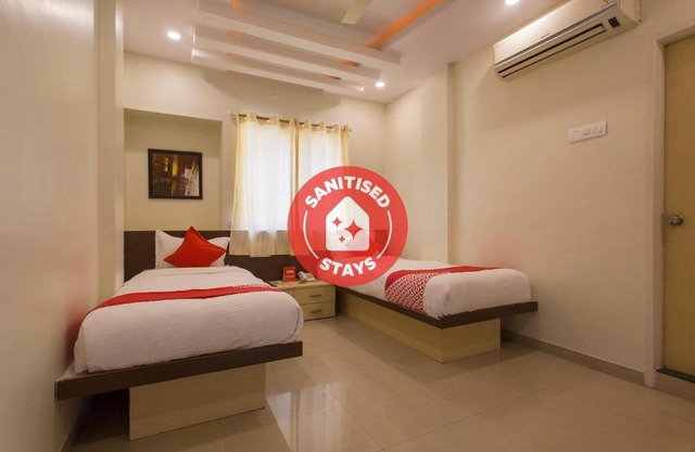 OYO 11566 Shree Swami Apartment