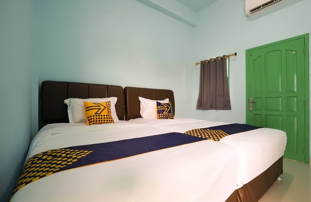 OYO 2738 818 Home StayNearAkbid Budi Mulya