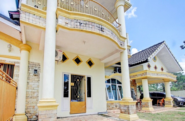 OYO 90307 Fj Alfaeyza Kost